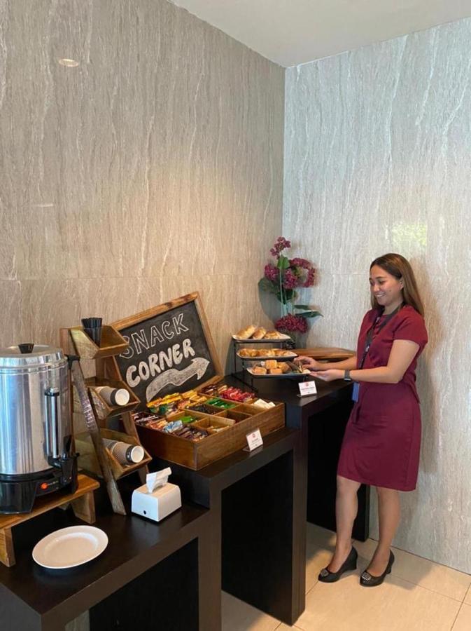 泗水新闻酒店 Waru 外观 照片